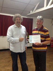 Mike Lawson  receiving his SLPS Exhibition 2014 Peoples Choice Award  certificate.