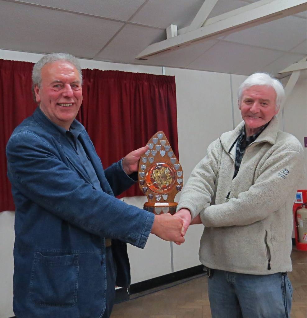 Tony Glover receiving the Trophy from final round judge, David Butler ARPS MFIAP EFIAP