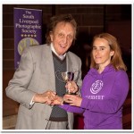 Tracey Dolan receiving the Most Improved Photographer of the Year award from Ken Dodd OBE
